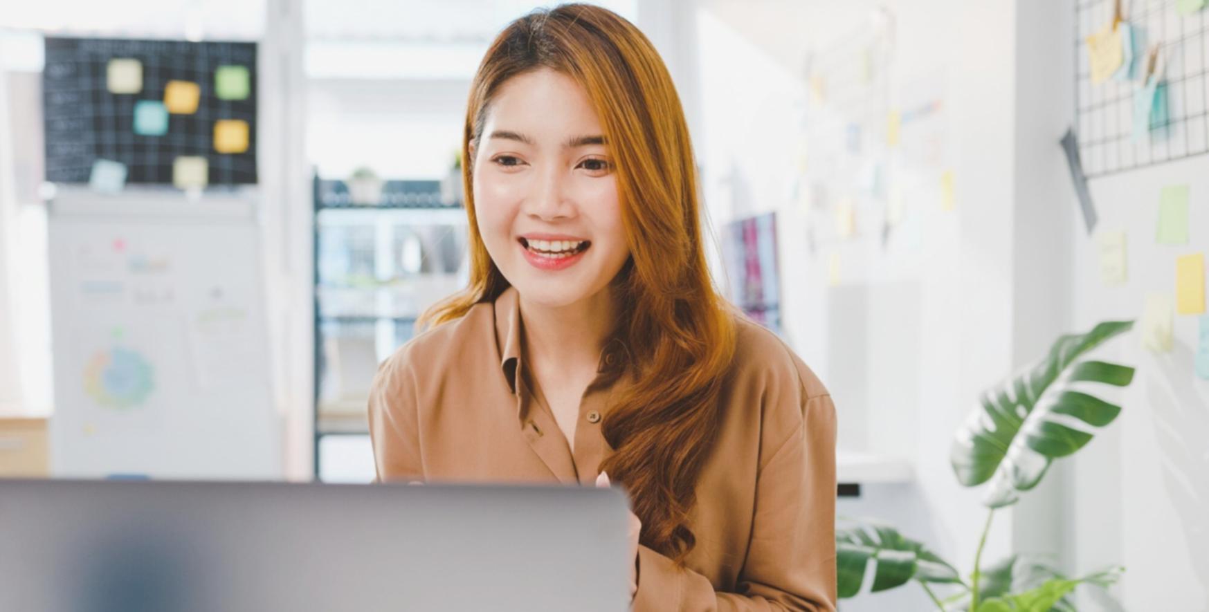 Collaborative workspace showing team members reviewing mobile SEO strategies and analytics